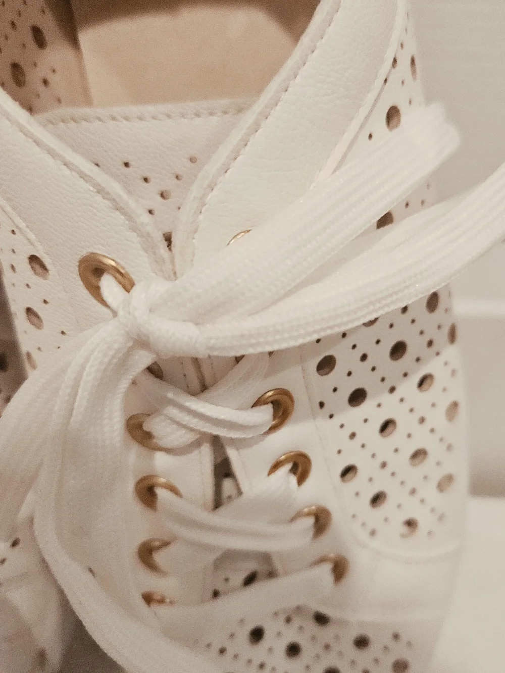 DV by Dolce Vita White Perforated Lace-Up Sneakers with Gold Eyelets